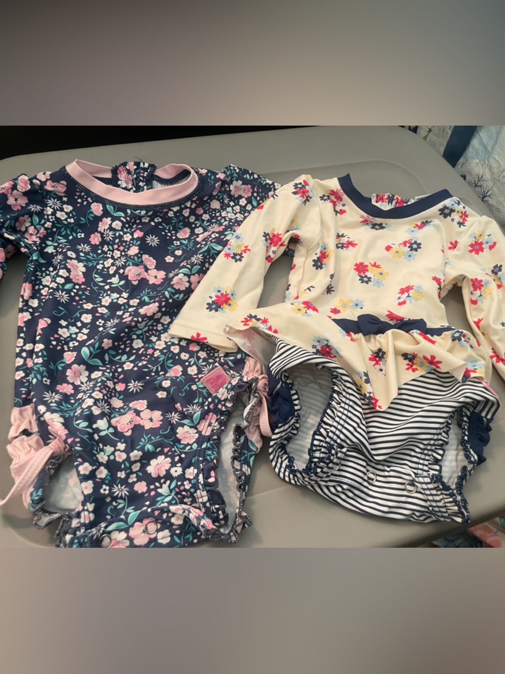 Ruffle Butts Navy Floral Toddler Swim Top with Pink Trim